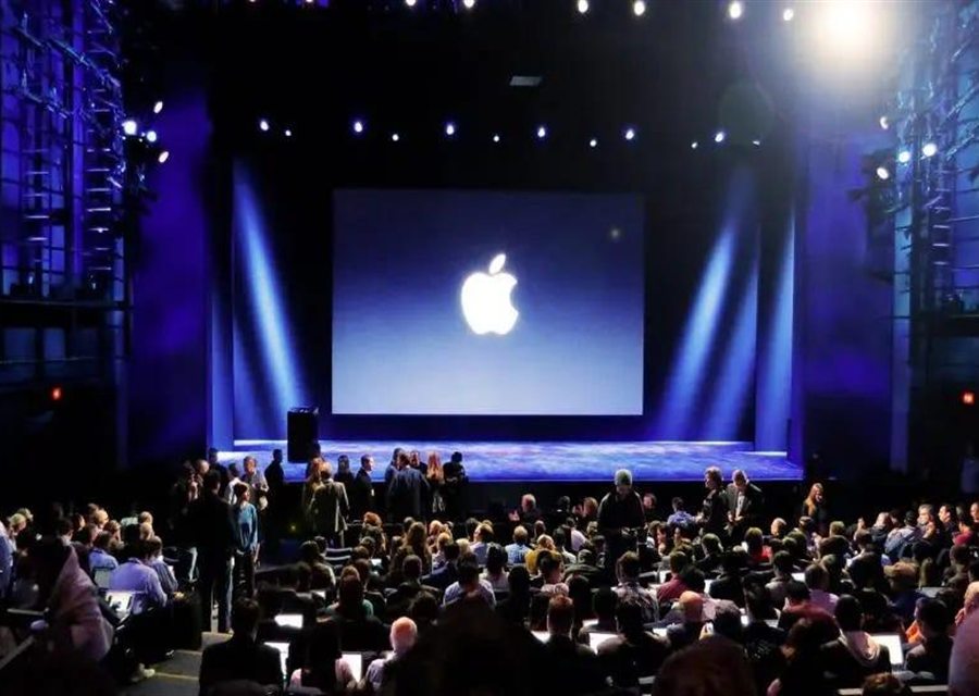 Audience attending a corporate event in an auditorium